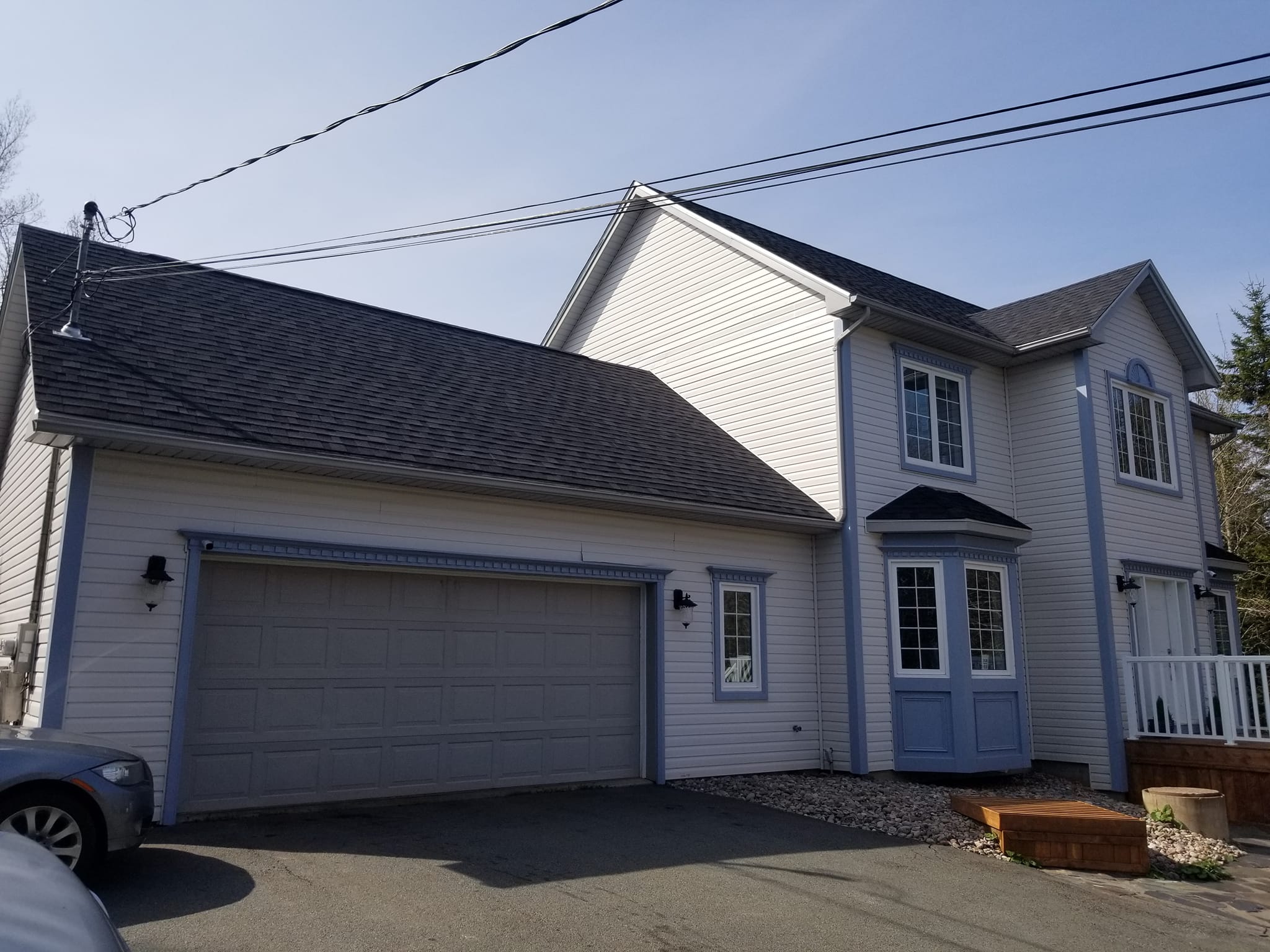 Grey and blue residential exterior painting